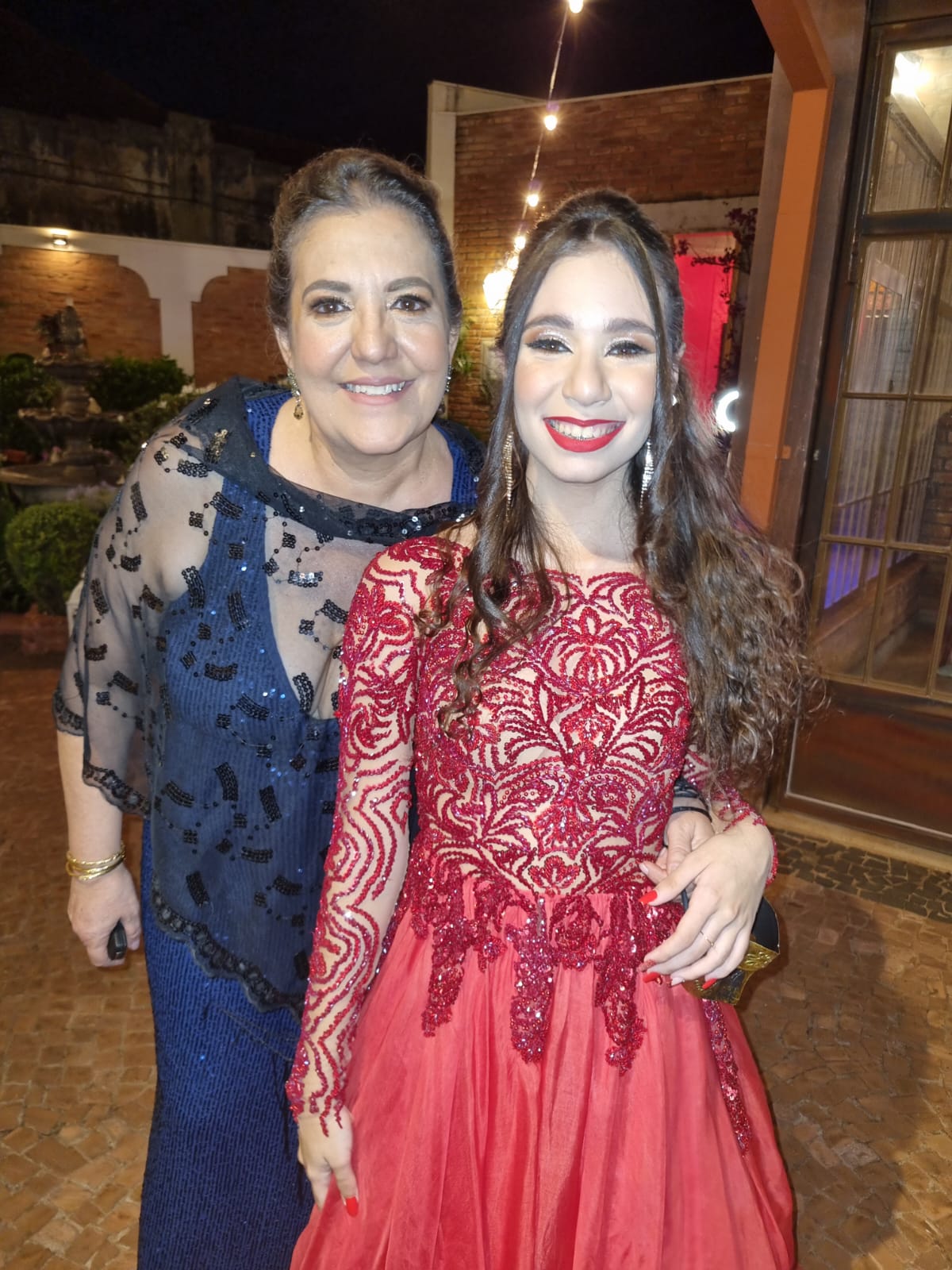 Guinair de Castro Favaro e sua filha Maria Clara.